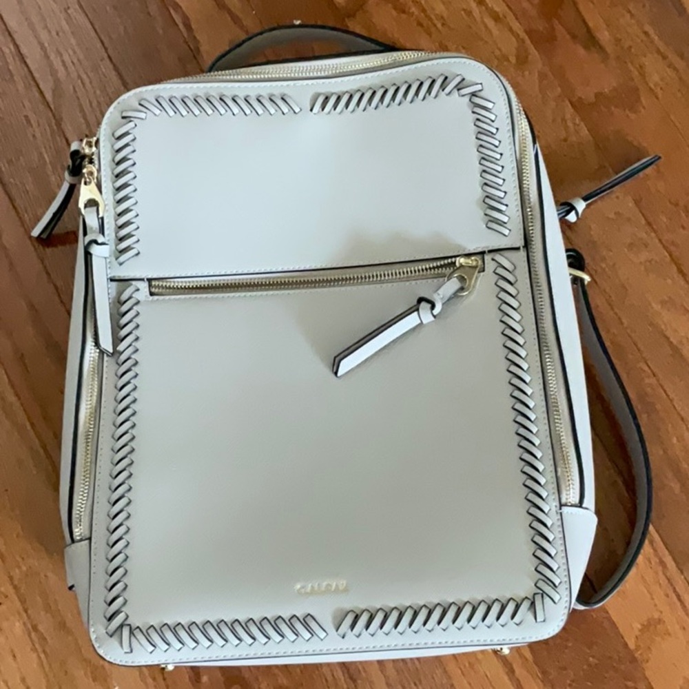 Calpak Kaya Faux Leather Laptop Backpack. Condition is like new